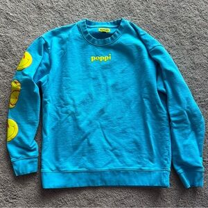 Poppi - blue sweatshirt, size large. Used in great condition